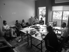 Young volunteers gathered around a table