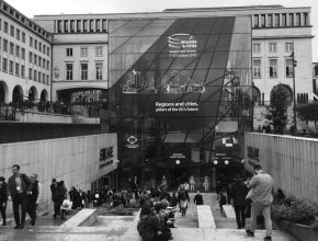 People gathered at the outdoor staircase of the conference